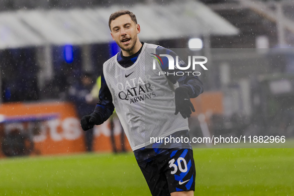 Carlos Augusto plays during the Coppa Italia match between FC Internazionale and Udinese Calcio at Giuseppe Meazza Stadium in Milano, Italy,...