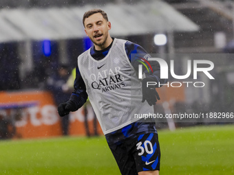 Carlos Augusto plays during the Coppa Italia match between FC Internazionale and Udinese Calcio at Giuseppe Meazza Stadium in Milano, Italy,...