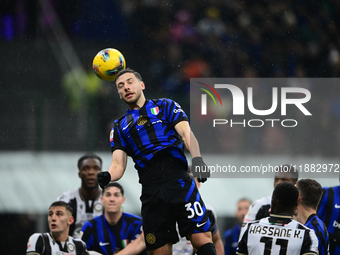 Carlos Augusto of Inter Milan is in action during the Coppa Italia Frecciarossa match between Inter Milan and Udinese Calcio at Giuseppe Mea...