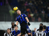 Carlos Augusto of Inter Milan is in action during the Coppa Italia Frecciarossa match between Inter Milan and Udinese Calcio at Giuseppe Mea...