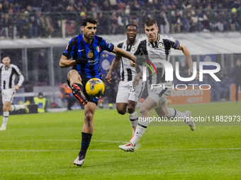 Mehdi Taremi plays during the Coppa Italia match between FC Internazionale and Udinese Calcio at Giuseppe Meazza Stadium in Milano, Italy, o...