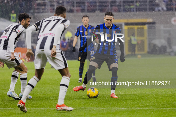 Piotr Zielinski plays during the Coppa Italia match between FC Internazionale and Udinese Calcio at Giuseppe Meazza Stadium in Milano, Italy...