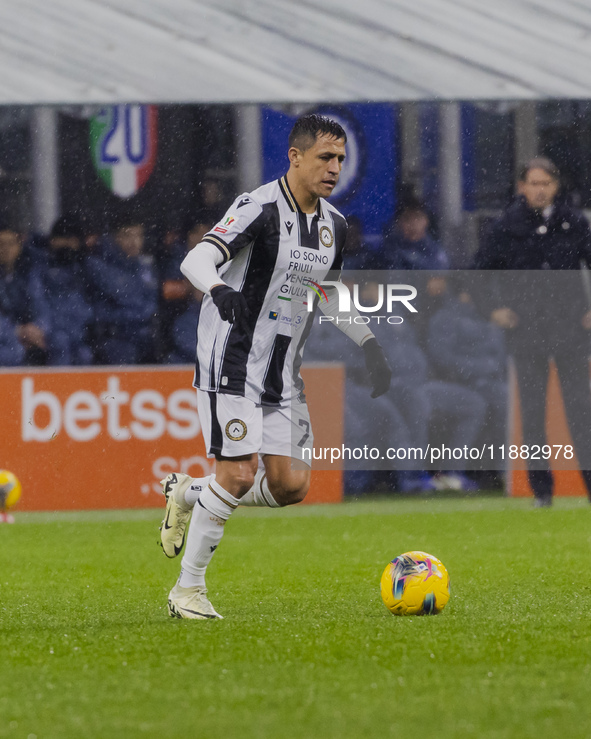 Alexis Sanchez plays during the Coppa Italia match between FC Internazionale and Udinese Calcio in Milano, Italy, on December 19, 2024, at G...