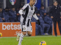 Alexis Sanchez plays during the Coppa Italia match between FC Internazionale and Udinese Calcio in Milano, Italy, on December 19, 2024, at G...