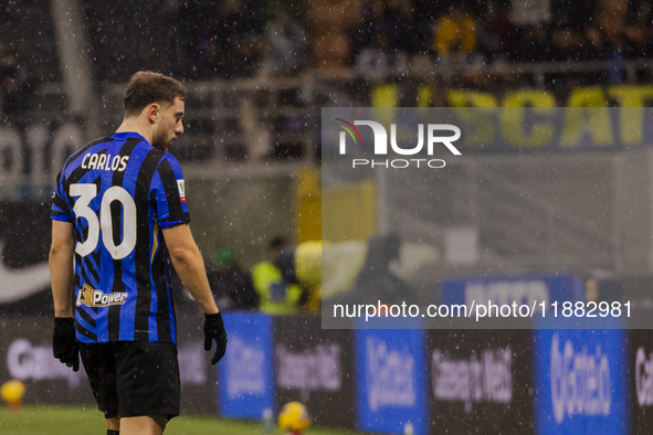 Carlos Augusto plays during the Coppa Italia match between FC Internazionale and Udinese Calcio at Giuseppe Meazza Stadium in Milano, Italy,...