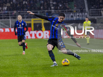 Alessandro Bastoni plays during the Coppa Italia match between FC Internazionale and Udinese Calcio at Giuseppe Meazza Stadium in Milano, It...