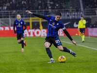 Alessandro Bastoni plays during the Coppa Italia match between FC Internazionale and Udinese Calcio at Giuseppe Meazza Stadium in Milano, It...