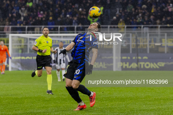 Carlos Augusto plays during the Coppa Italia match between FC Internazionale and Udinese Calcio at Giuseppe Meazza Stadium in Milano, Italy,...