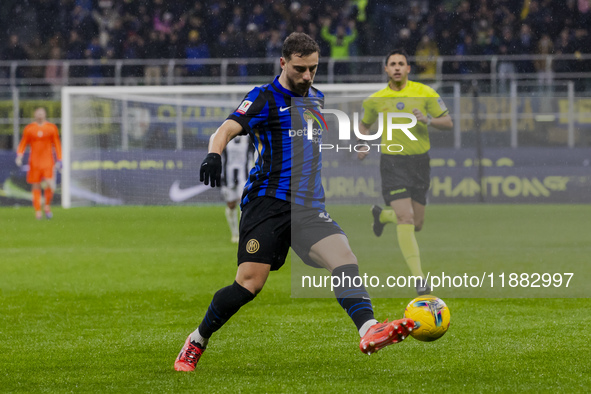 Carlos Augusto plays during the Coppa Italia match between FC Internazionale and Udinese Calcio at Giuseppe Meazza Stadium in Milano, Italy,...