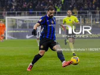 Carlos Augusto plays during the Coppa Italia match between FC Internazionale and Udinese Calcio at Giuseppe Meazza Stadium in Milano, Italy,...