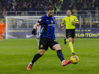 Carlos Augusto plays during the Coppa Italia match between FC Internazionale and Udinese Calcio at Giuseppe Meazza Stadium in Milano, Italy,...