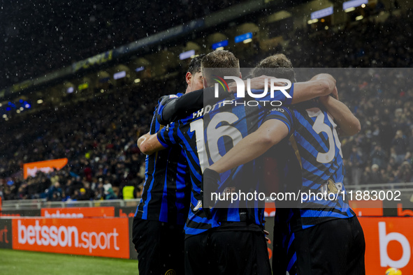 Marko Arnautovic, Davide Frattesi, and Carlos Augusto celebrate the goal during the Coppa Italia match between FC Internazionale and Udinese...