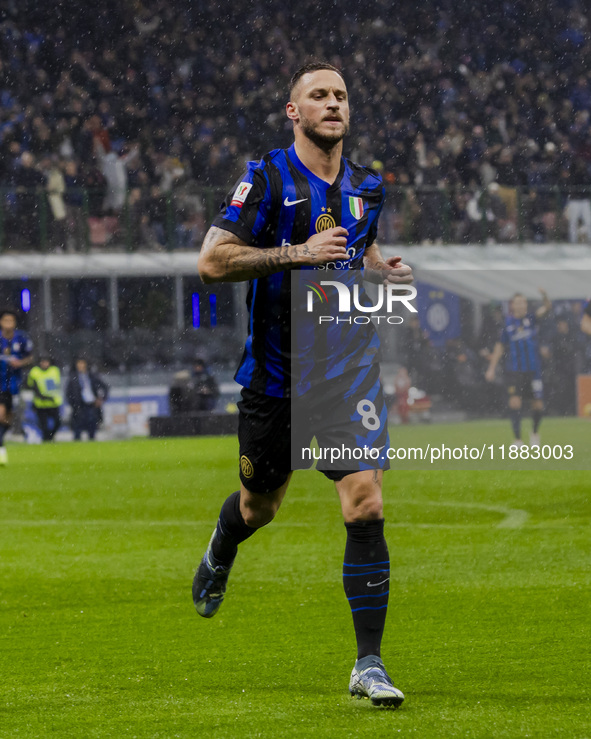 Marko Arnautovic celebrates the goal during the Coppa Italia match between FC Internazionale and Udinese Calcio at Giuseppe Meazza Stadium i...