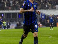 Marko Arnautovic celebrates the goal during the Coppa Italia match between FC Internazionale and Udinese Calcio at Giuseppe Meazza Stadium i...