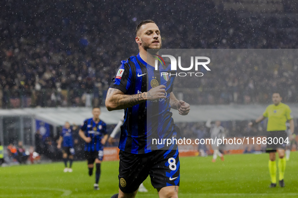 Marko Arnautovic celebrates the goal during the Coppa Italia match between FC Internazionale and Udinese Calcio at Giuseppe Meazza Stadium i...