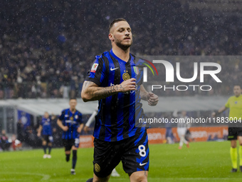 Marko Arnautovic celebrates the goal during the Coppa Italia match between FC Internazionale and Udinese Calcio at Giuseppe Meazza Stadium i...