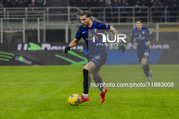 Carlos Augusto plays during the Coppa Italia match between FC Internazionale and Udinese Calcio at Giuseppe Meazza Stadium in Milano, Italy,...