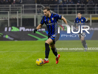 Carlos Augusto plays during the Coppa Italia match between FC Internazionale and Udinese Calcio at Giuseppe Meazza Stadium in Milano, Italy,...