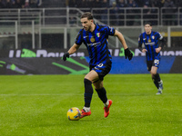 Carlos Augusto plays during the Coppa Italia match between FC Internazionale and Udinese Calcio at Giuseppe Meazza Stadium in Milano, Italy,...