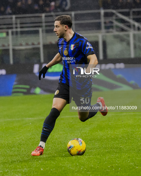 Carlos Augusto plays during the Coppa Italia match between FC Internazionale and Udinese Calcio at Giuseppe Meazza Stadium in Milano, Italy,...