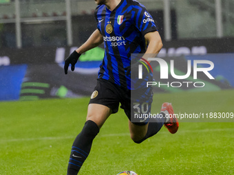 Carlos Augusto plays during the Coppa Italia match between FC Internazionale and Udinese Calcio at Giuseppe Meazza Stadium in Milano, Italy,...