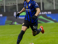 Carlos Augusto plays during the Coppa Italia match between FC Internazionale and Udinese Calcio at Giuseppe Meazza Stadium in Milano, Italy,...