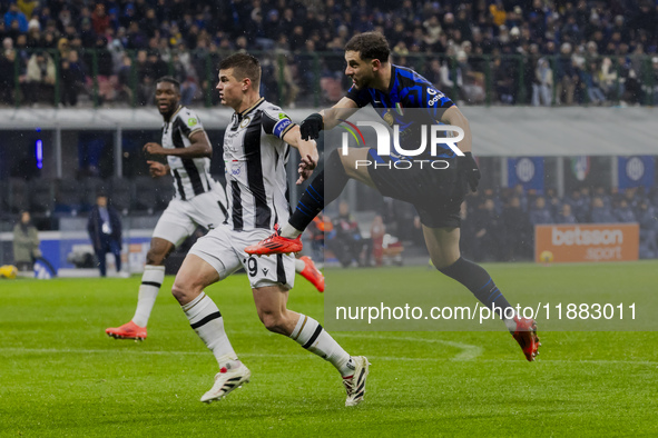 Carlos Augusto plays during the Coppa Italia match between FC Internazionale and Udinese Calcio at Giuseppe Meazza Stadium in Milano, Italy,...