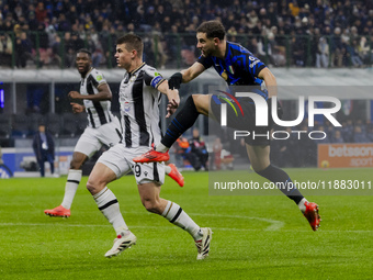 Carlos Augusto plays during the Coppa Italia match between FC Internazionale and Udinese Calcio at Giuseppe Meazza Stadium in Milano, Italy,...