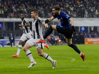 Carlos Augusto plays during the Coppa Italia match between FC Internazionale and Udinese Calcio at Giuseppe Meazza Stadium in Milano, Italy,...