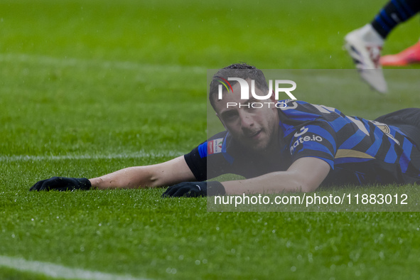 Carlos Augusto plays during the Coppa Italia match between FC Internazionale and Udinese Calcio at Giuseppe Meazza Stadium in Milano, Italy,...