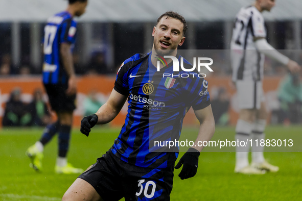 Carlos Augusto plays during the Coppa Italia match between FC Internazionale and Udinese Calcio at Giuseppe Meazza Stadium in Milano, Italy,...