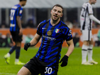 Carlos Augusto plays during the Coppa Italia match between FC Internazionale and Udinese Calcio at Giuseppe Meazza Stadium in Milano, Italy,...