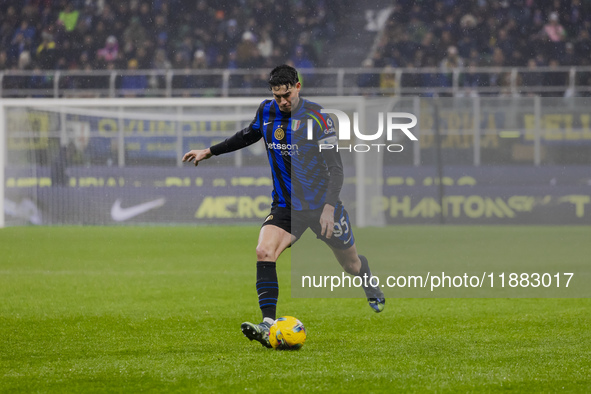 Alessandro Bastoni plays during the Coppa Italia match between FC Internazionale and Udinese Calcio at Giuseppe Meazza Stadium in Milano, It...