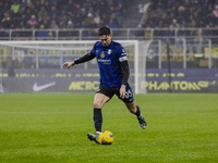 Alessandro Bastoni plays during the Coppa Italia match between FC Internazionale and Udinese Calcio at Giuseppe Meazza Stadium in Milano, It...