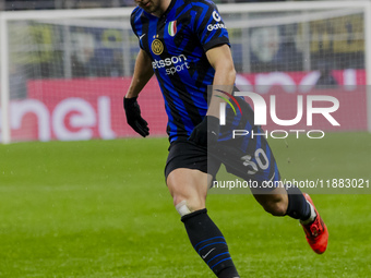 Carlos Augusto plays during the Coppa Italia match between FC Internazionale and Udinese Calcio at Giuseppe Meazza Stadium in Milano, Italy,...