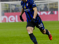 Carlos Augusto plays during the Coppa Italia match between FC Internazionale and Udinese Calcio at Giuseppe Meazza Stadium in Milano, Italy,...