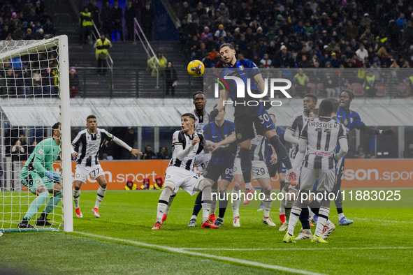 Carlos Augusto plays during the Coppa Italia match between FC Internazionale and Udinese Calcio at Giuseppe Meazza Stadium in Milano, Italy,...