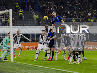 Carlos Augusto plays during the Coppa Italia match between FC Internazionale and Udinese Calcio at Giuseppe Meazza Stadium in Milano, Italy,...