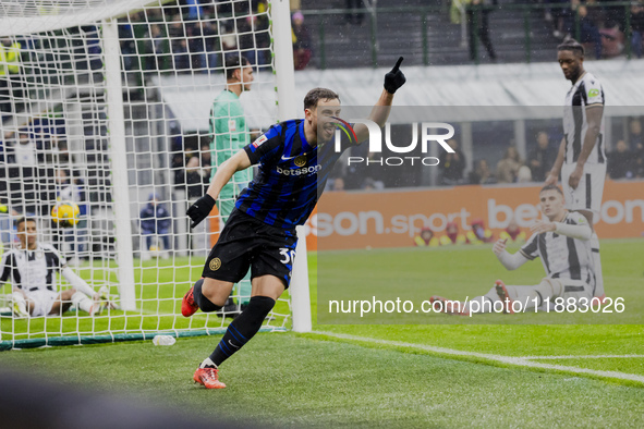 Carlos Augusto celebrates the goal during the Coppa Italia match between FC Internazionale and Udinese Calcio in Milano, Italy, on December...