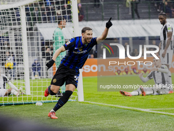 Carlos Augusto celebrates the goal during the Coppa Italia match between FC Internazionale and Udinese Calcio in Milano, Italy, on December...