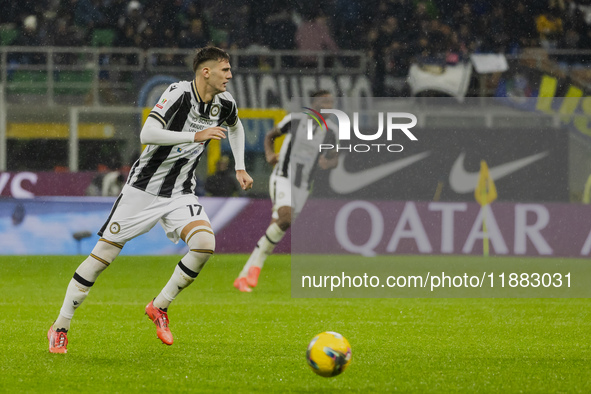 Lorenzo Lucca plays during the Coppa Italia match between FC Internazionale and Udinese Calcio in Milano, Italy, on December 19, 2024, at Gi...