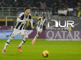 Lorenzo Lucca plays during the Coppa Italia match between FC Internazionale and Udinese Calcio in Milano, Italy, on December 19, 2024, at Gi...