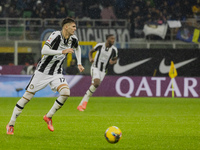 Lorenzo Lucca plays during the Coppa Italia match between FC Internazionale and Udinese Calcio in Milano, Italy, on December 19, 2024, at Gi...