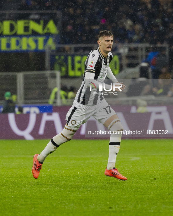 Lorenzo Lucca plays during the Coppa Italia match between FC Internazionale and Udinese Calcio in Milano, Italy, on December 19, 2024, at Gi...