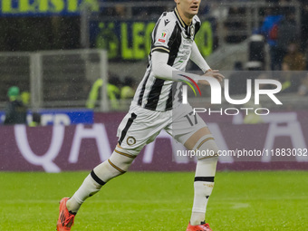 Lorenzo Lucca plays during the Coppa Italia match between FC Internazionale and Udinese Calcio in Milano, Italy, on December 19, 2024, at Gi...