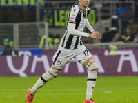 Lorenzo Lucca plays during the Coppa Italia match between FC Internazionale and Udinese Calcio in Milano, Italy, on December 19, 2024, at Gi...