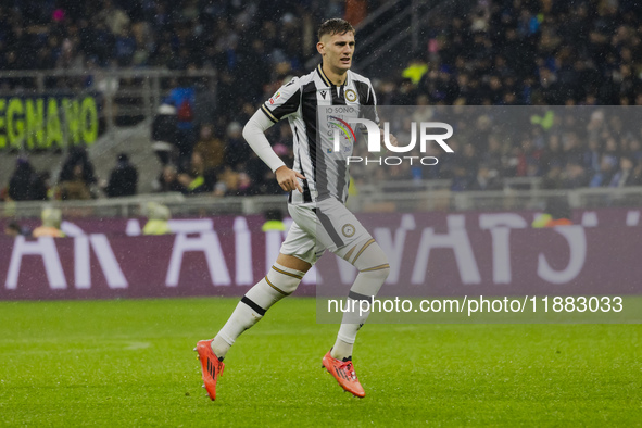 Lorenzo Lucca plays during the Coppa Italia match between FC Internazionale and Udinese Calcio in Milano, Italy, on December 19, 2024, at Gi...