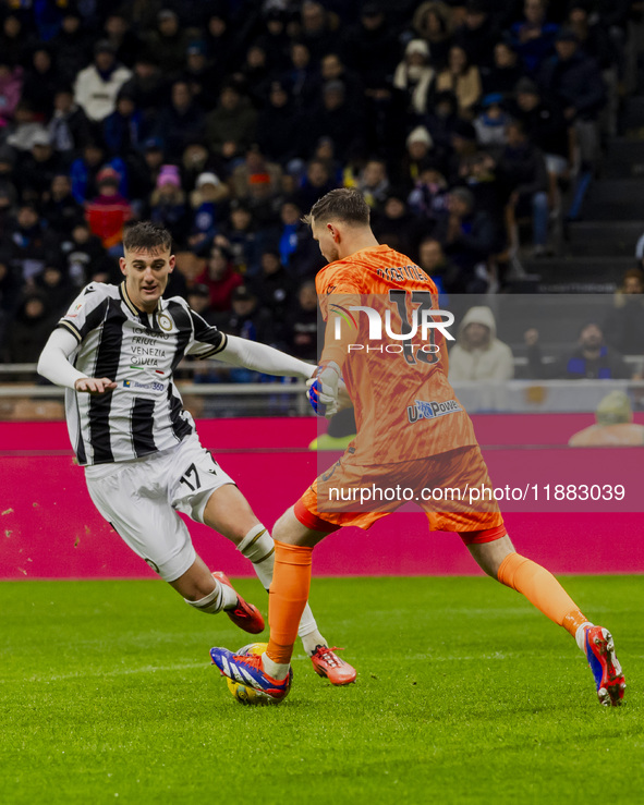 Josep Martinez plays during the Coppa Italia match between FC Internazionale and Udinese Calcio in Milano, Italy, on December 19, 2024, at G...