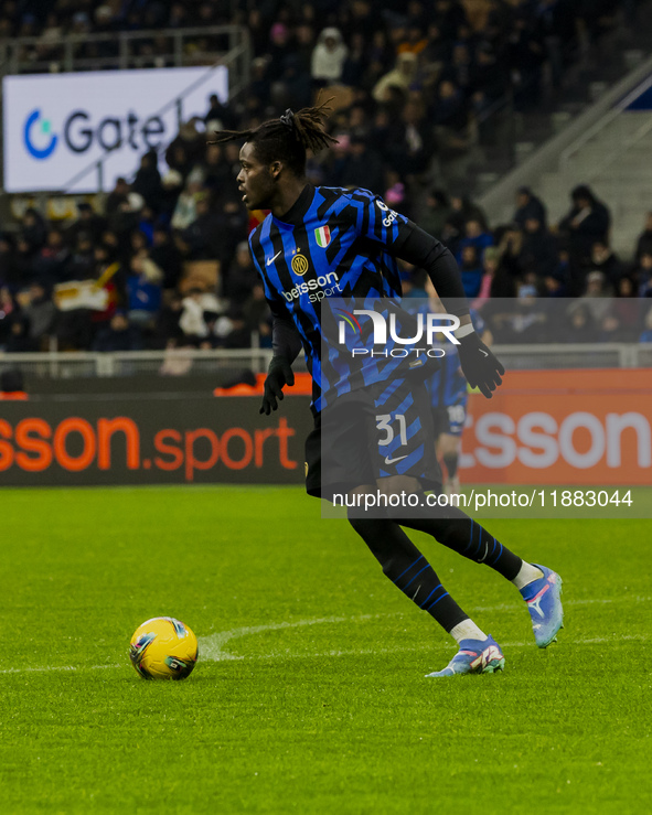 Yann Bisseck plays during the Coppa Italia match between FC Internazionale and Udinese Calcio in Milano, Italy, on December 19, 2024, at Giu...