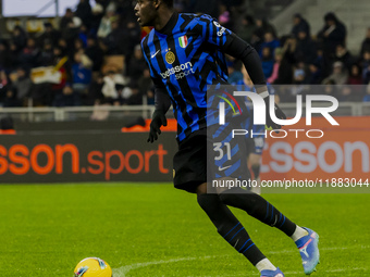 Yann Bisseck plays during the Coppa Italia match between FC Internazionale and Udinese Calcio in Milano, Italy, on December 19, 2024, at Giu...